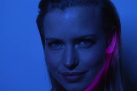 Moving Pink Light on Blonde Models Face (Stock Footage) 24565929
